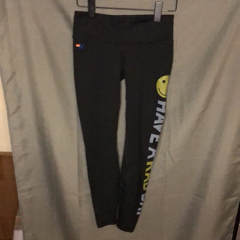 Aviator Nation Black Leggings with Yellow Smiley and White/Yellow Side Script - Picture 2 of 8
